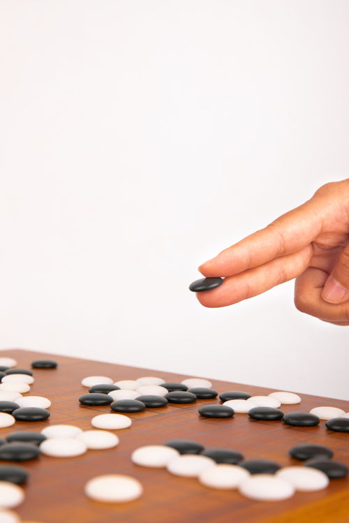 围棋下棋摄影棚拍摄摄影图 摄影