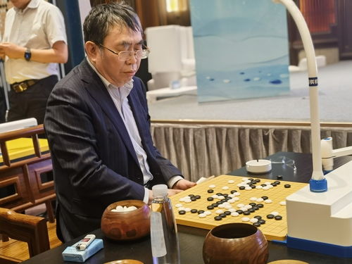 与机器人下围棋的是谁 今日头条